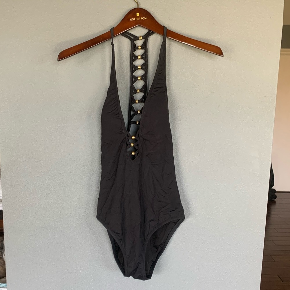 Trina Turk Black one piece bathing suit. Size 4